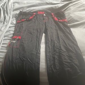 Black and red low rise pants